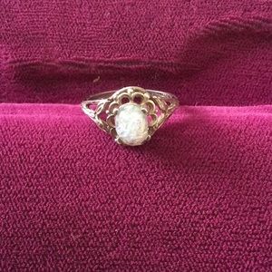 Silver ring with opal style stone